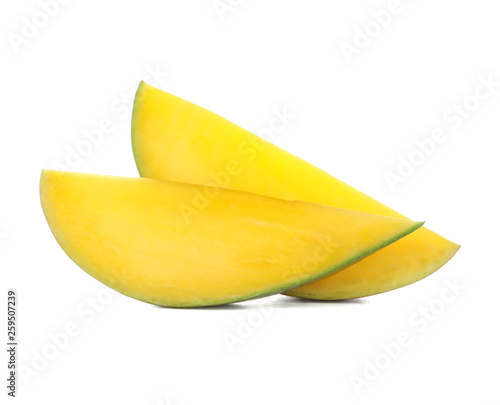 Two pieces of mango isolated on white background, close up