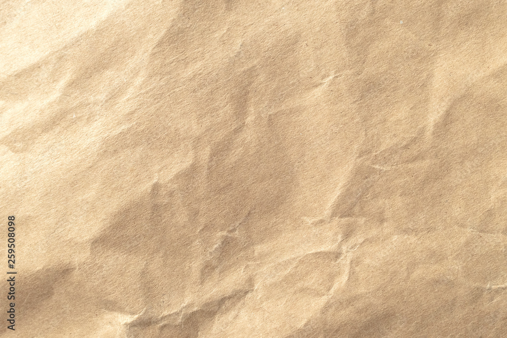 Brown crumpled paper texture background. Brown crumpled paper texture background.
