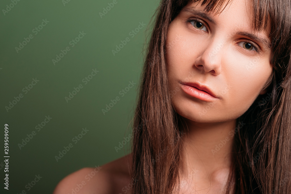 Confused looking beautiful girl. Disappointed facial expression. Closeup portrait of emotional lady. Copy space. Confused looking beautiful girl. Disappointed facial expression. Closeup portrait of emotional lady. Copy space.