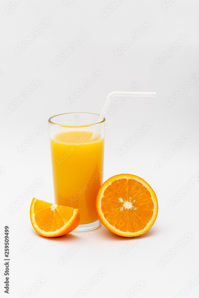 glass of orange juice and sliced orange on a white background glass of orange juice and sliced orange on a white background