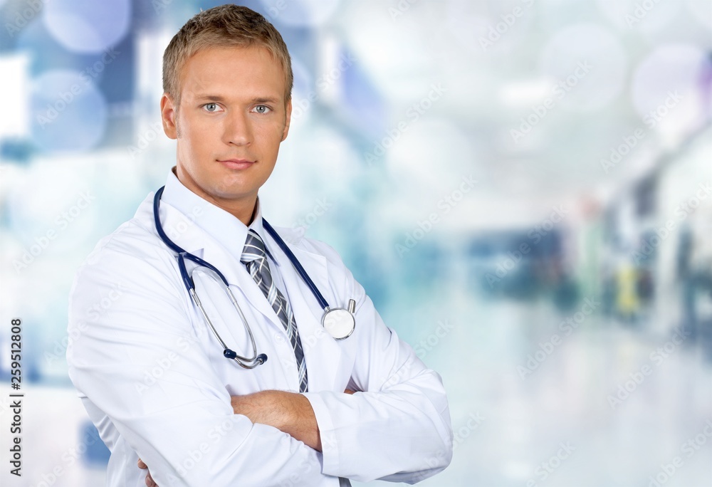 Portrait of doctor with arms crossed in Portrait of doctor with arms crossed in