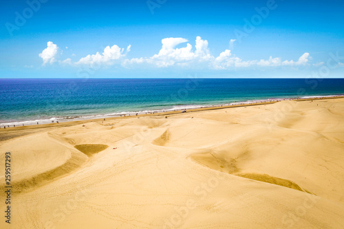 Fototapeta Naklejka Na Ścianę i Meble -  Aerial photo of summer beach and blue ocean with sky. 