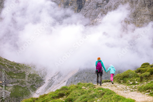 tourist girl at the Dolomites © Sergii Mostovyi