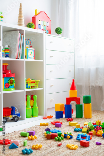 Children's playroom with plastic colorful educational blocks toys. Games floor for preschoolers kindergarten. interior children's room.