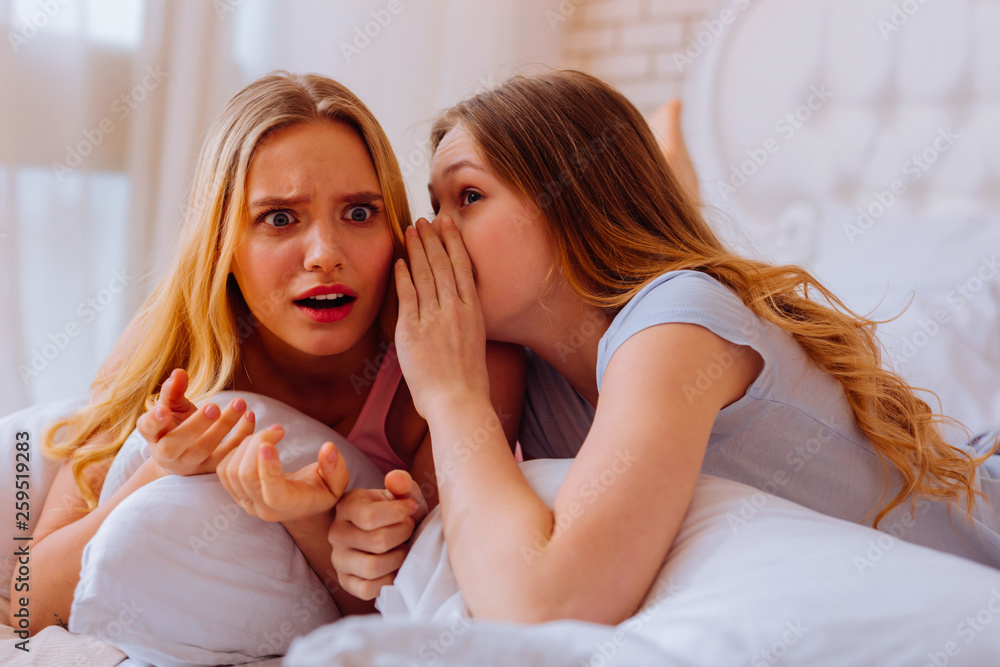 Older sister feeling shocked after hearing news from sibling