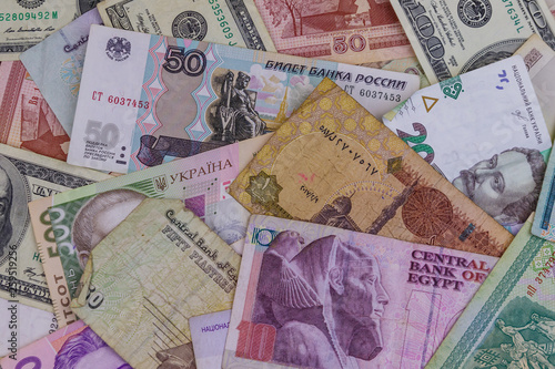 Multicurrency background of US dollars, Russian rubles, Belarusian rubles, Egyptian pounds and Ukrainian hryvnias