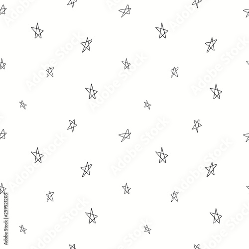 Hand drawn seamless pattern with stars, black on white background. Vector illustration. Line drawing. Concept for children textile print, wallpaper, wrapping paper. © Maria Skrigan