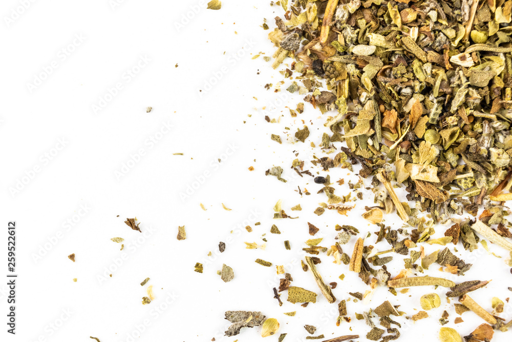 Spices are a mixture of spicy herbs for cooking meat and salads close-up on a light background. On the image there is a place for text, it is suitable as a background for culinary subjects. Macro. Spices are a mixture of spicy herbs for cooking meat and salads close-up on a light background. On the image there is a place for text, it is suitable as a background for culinary subjects. Macro.