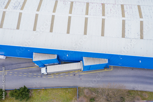 Aerial Shot of Industrial Warehouse/ Storage Building/ Loading