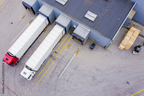 Obraz na płótnie Aerial Shot of Industrial Warehouse/ Storage Building/ Loading