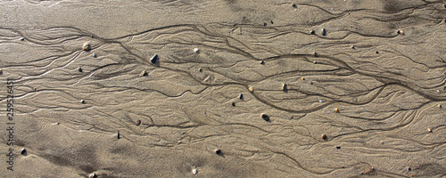 Patterns on the beach left by receding tide