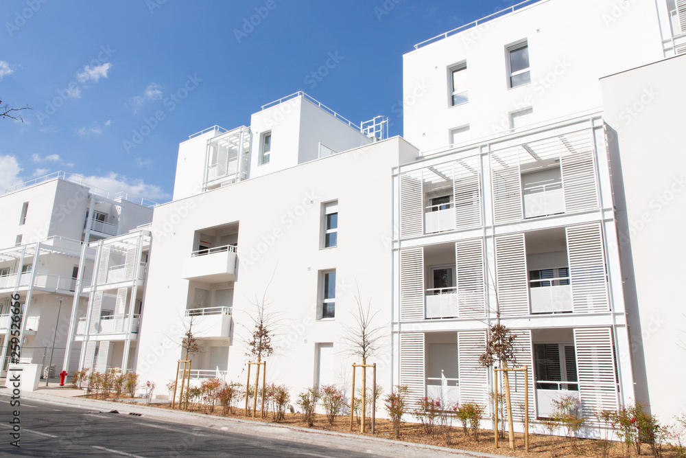 Modern Building Facade white on blue sky