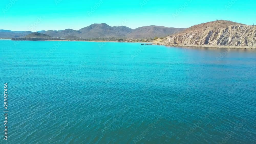 Aerial of the Sea of Cortez slong the Baja California coastline near Mulege, Mexico during a sunny summer day. Aerial of the Sea of Cortez slong the Baja California coastline near Mulege, Mexico during a sunny summer day.