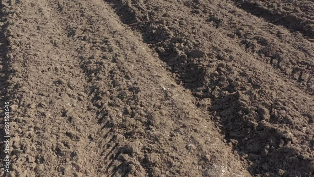 Earth after plowing before spring 4K drone video Earth after plowing before spring 4K drone video