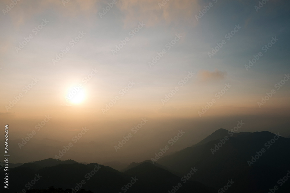 Light morning fog, sunrise and spectacular mountain ranges lined alternated beautifully. Khao Jed Yod, Trang in Thailand. Light morning fog, sunrise and spectacular mountain ranges lined alternated beautifully. Khao Jed Yod, Trang in Thailand.