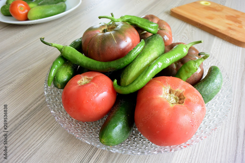 Fresh organic vegetables in glass bowl Fresh organic vegetables in glass bowl