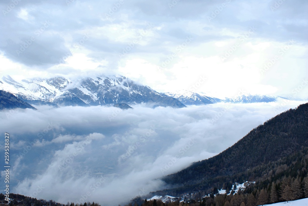 Mountains between clouds, Sion , Switzerland