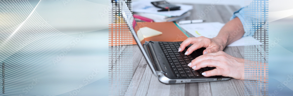 Female hands using a laptop. panoramic banner Female hands using a laptop. panoramic banner