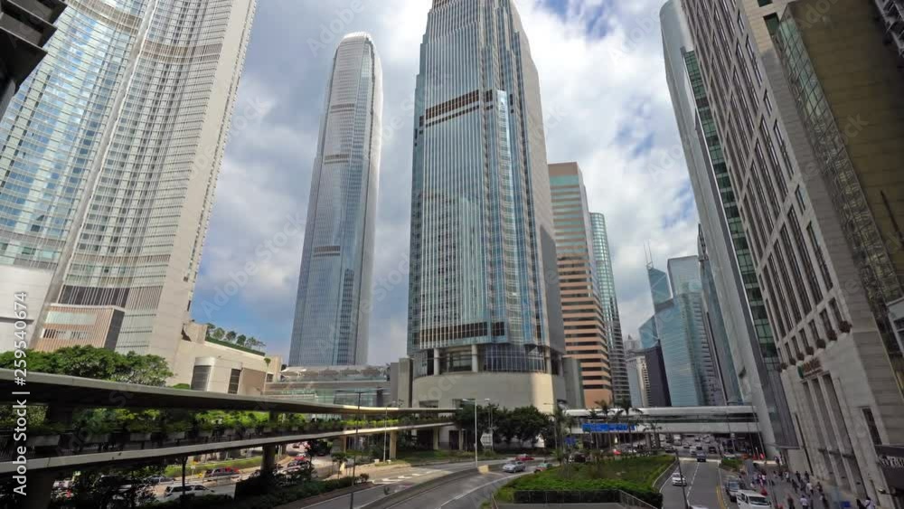 Tilt down from the cloud-filled sky to the skyscrapers of Hong Kong. Tilt down from the cloud-filled sky to the skyscrapers of Hong Kong.