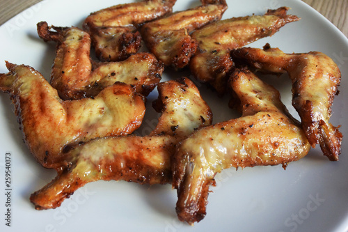 Chicken wings in white plate