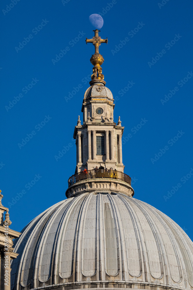 Fototapeta premium The Moon Perched on St. Pauls Cathedral