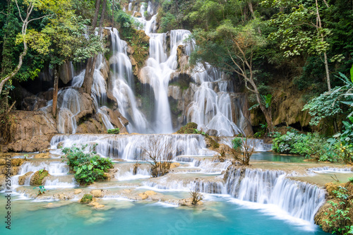 The Kuang Si Falls or known as Tat Kuang Si Waterfalls. These waterfalls are a favorite side trip for tourists in Luang Prabang with a turquoise blue pool