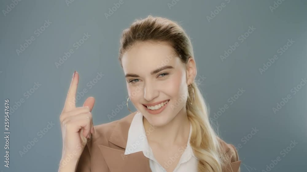 Happy businesswoman think idea in studio. Portrait of smiling person have idea Happy businesswoman think idea in studio. Portrait of smiling person have idea