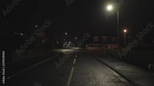 A typical town street in the UK at night photo