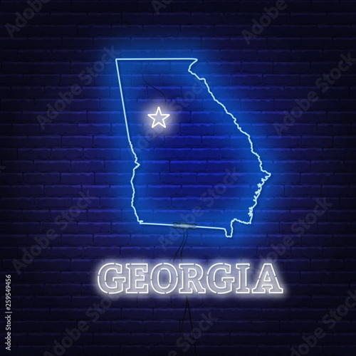 Neon map State of Georgia on a brick wall background.