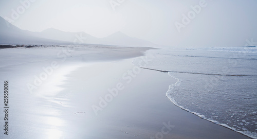 Beach landscape -  Cofete  Fuerteventura  Canary Islands. Perfect place for the coast lovers. Tourist holiday destination  background  copy space.