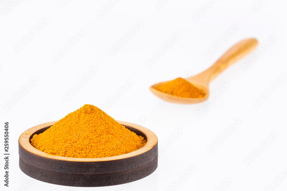 Organic turmeric powder - Curcuma longa. White background Organic turmeric powder - Curcuma longa. White background