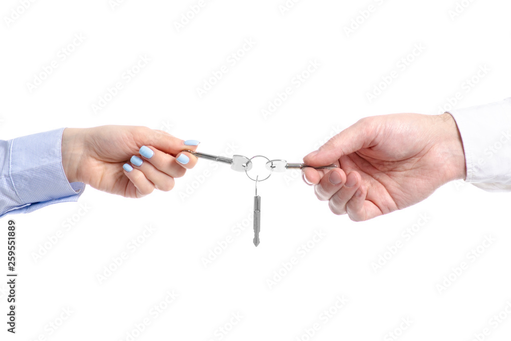 Hand give key to hand on white background isolation Hand give key to hand on white background isolation