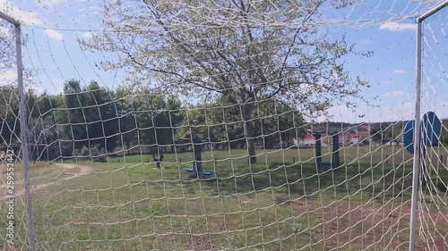 Transition from an exercise space to a soccer field photo