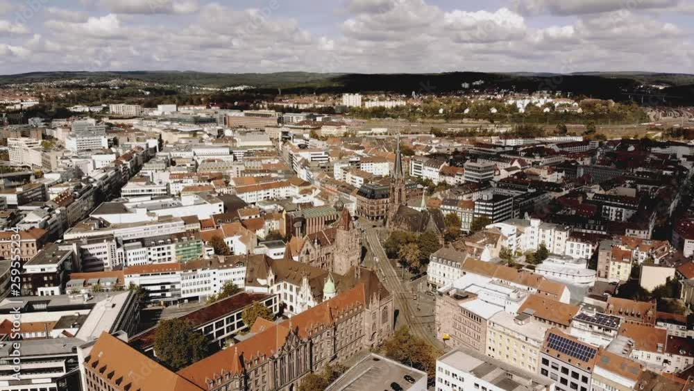Saarbruecken from the birdseye view. Wide aerial shot flying backwards over the city in Western Germany. Saarbruecken from the birdseye view. Wide aerial shot flying backwards over the city in Western Germany.