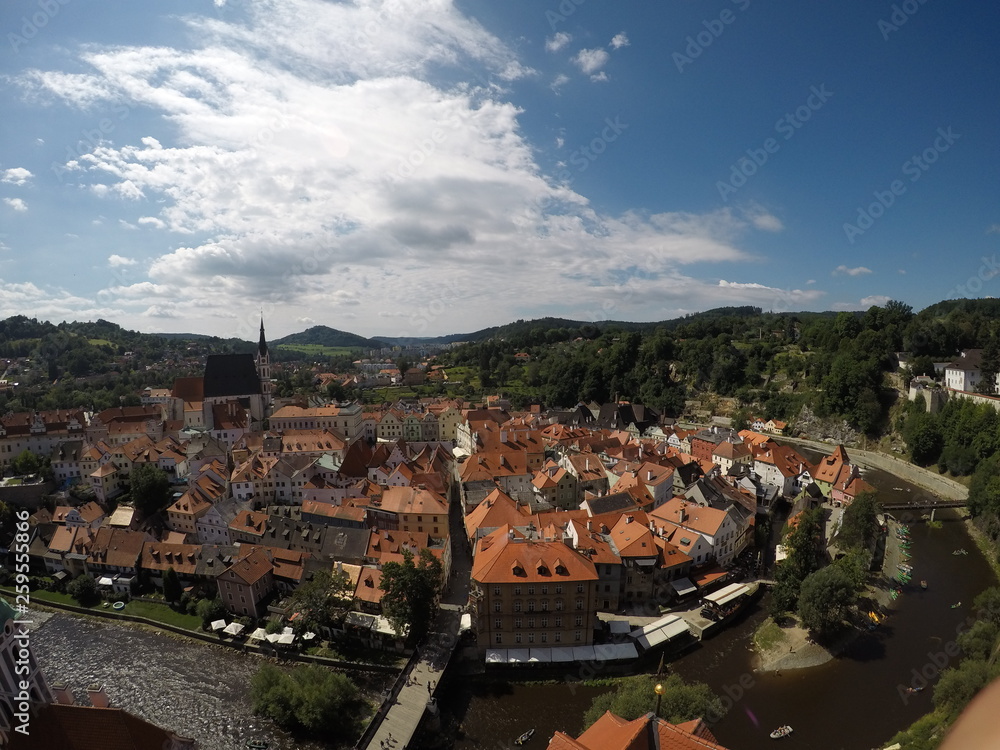 European Old Ancient Castle in Cesky Krumlov in the Czech Republic. Historical centre. A single color of roofs. Nature in old European city. Summary photos of the city. Beautiful old architecture.