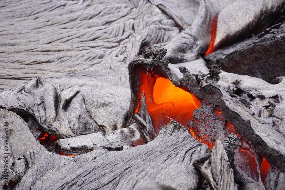 Lava field with new hot flowing lava in Big Island in Hawaii Lava field with new hot flowing lava in Big Island in Hawaii