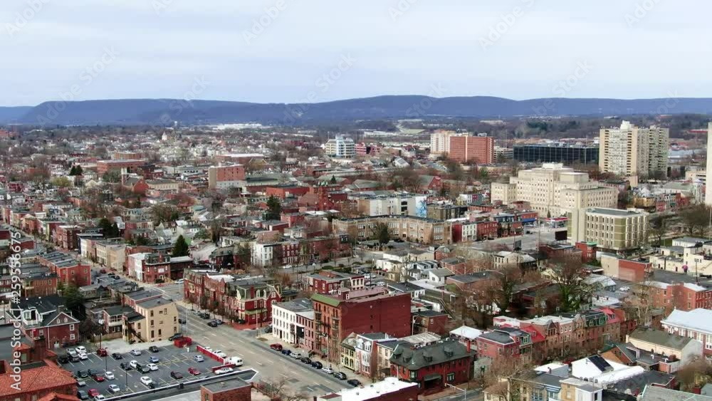 Aerial pan of historic downtown in Harrisburg, PA, with colonial style buildings, left to right camera movement Aerial pan of historic downtown in Harrisburg, PA, with colonial style buildings, left to right camera movement