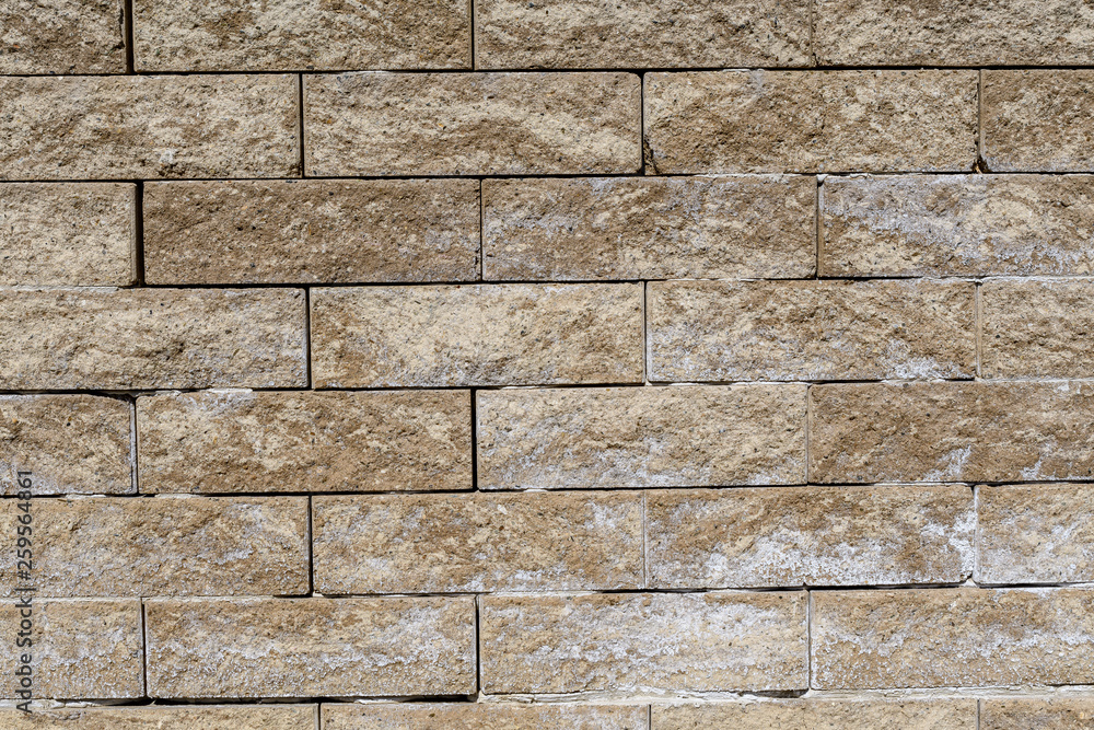 Background of old beige brown bricks in horizontal display Background of old beige brown bricks in horizontal display