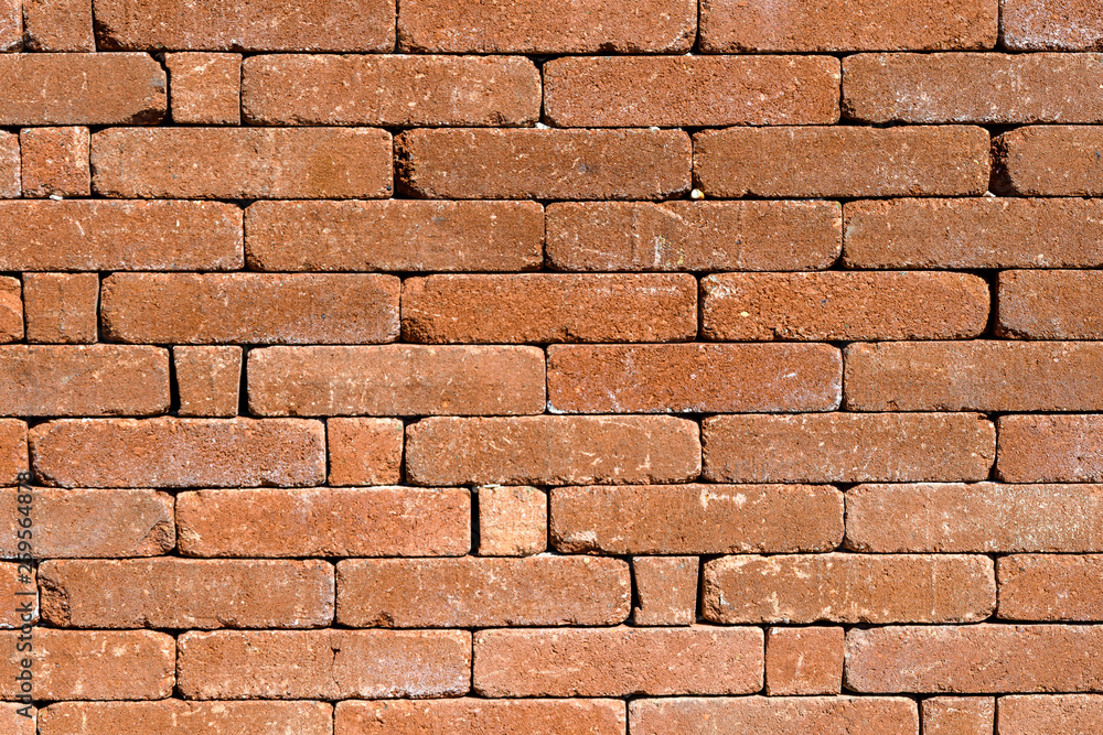 Background of old red brown bricks in horizontal display Background of old red brown bricks in horizontal display