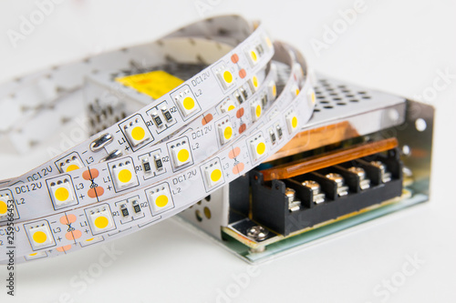 LED ligts strip and voltage converter for decoration of interiors. LED tape. photo