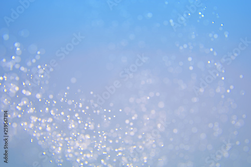 Glitter abstract lights background. Defocused bokeh illustration