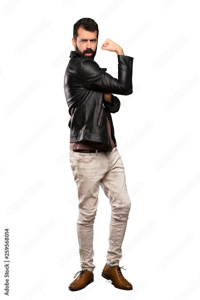 Handsome man with beard doing strong gesture over isolated white background Handsome man with beard doing strong gesture over isolated white background