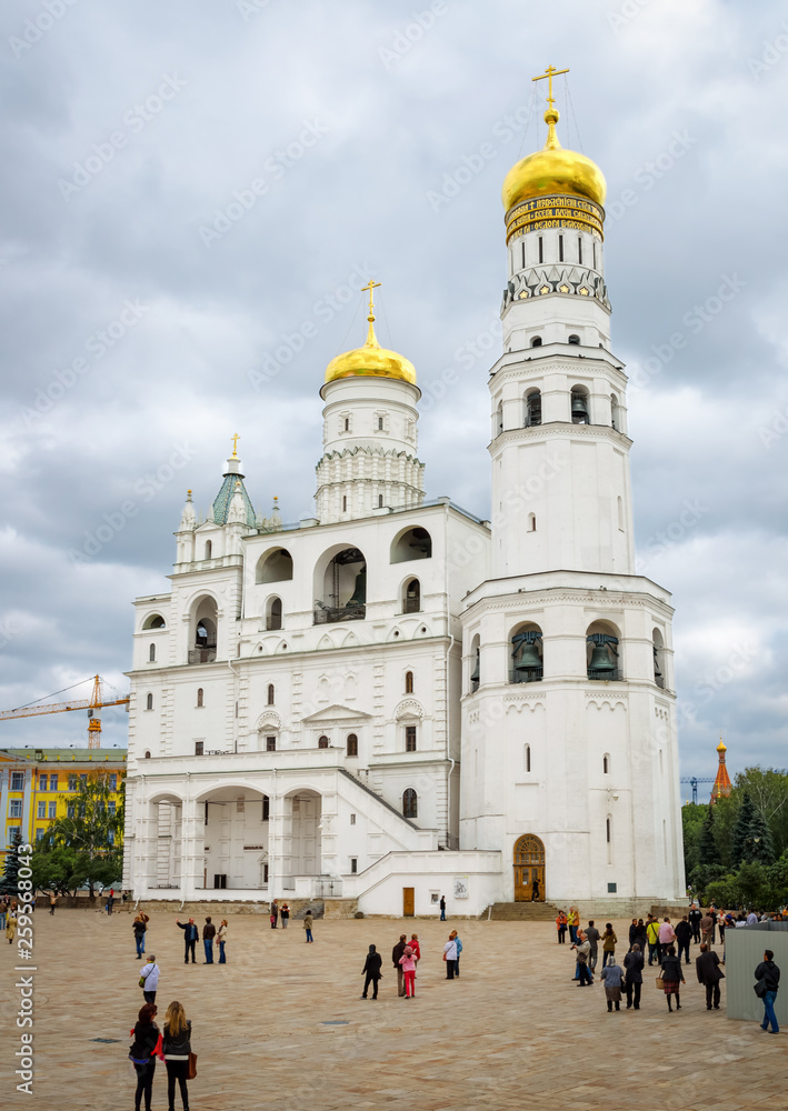 View of the Ivan the Great Bell-Tower, the Assumption Belfry and the Filaret's extension in Kremlin. Unidentified people present on picture.