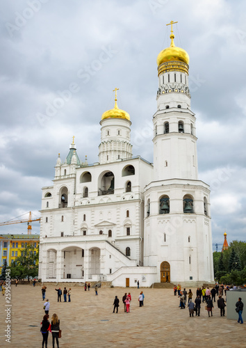 View of the Ivan the Great Bell-Tower, the Assumption Belfry and the Filaret's extension in Kremlin. Unidentified people present on picture. photo