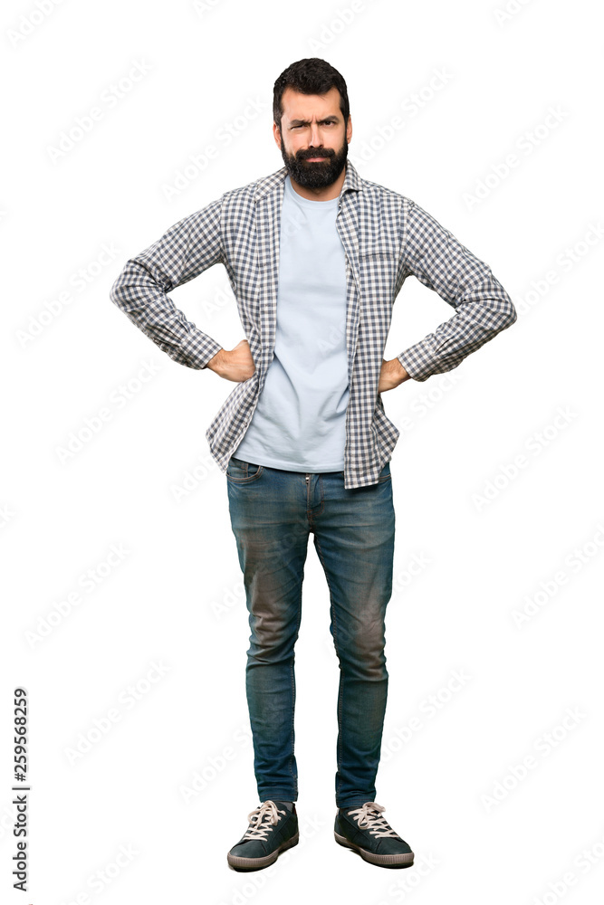 Handsome man with beard angry over isolated white background Handsome man with beard angry over isolated white background