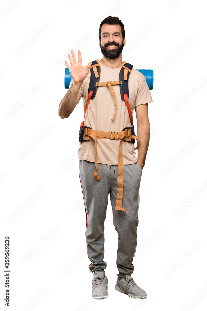 Hiker man counting five with fingers over isolated white background Hiker man counting five with fingers over isolated white background