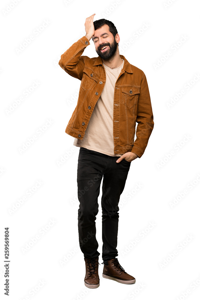 Handsome man with beard has realized something and intending the solution over isolated white background Handsome man with beard has realized something and intending the solution over isolated white background