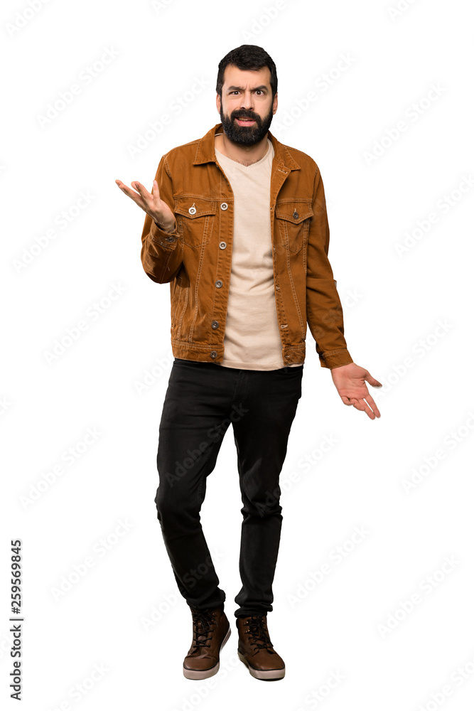 Handsome man with beard making doubts gesture over isolated white background Handsome man with beard making doubts gesture over isolated white background