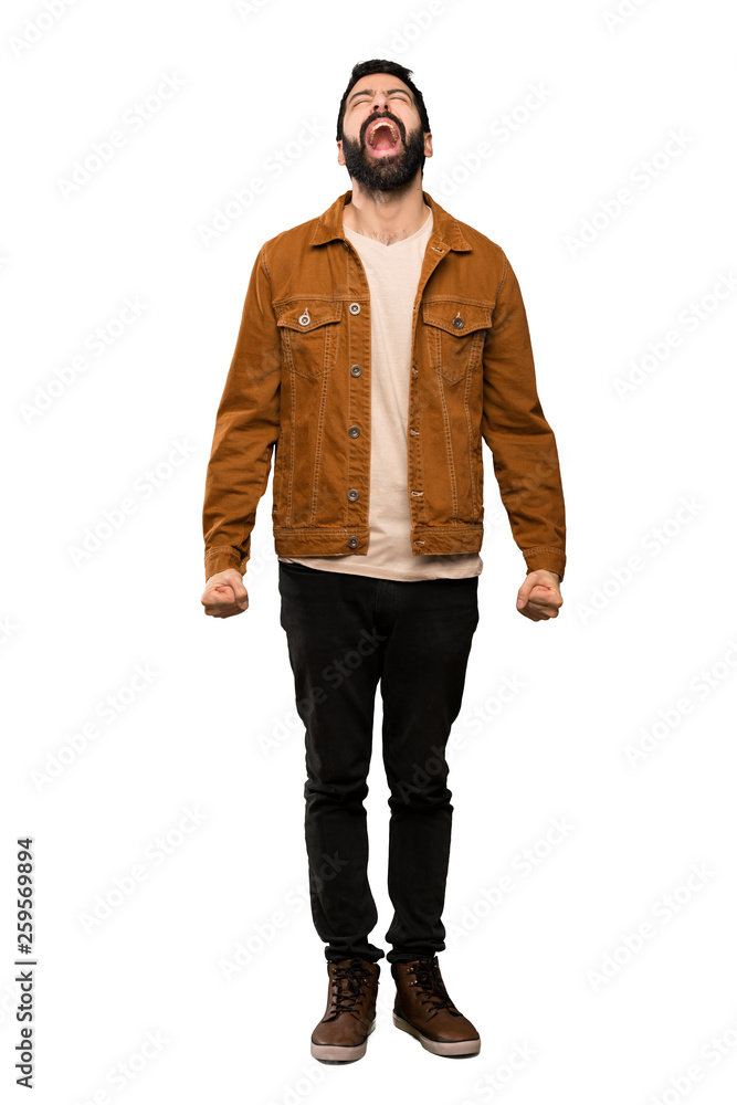 Handsome man with beard shouting to the front with mouth wide open over isolated white background Handsome man with beard shouting to the front with mouth wide open over isolated white background