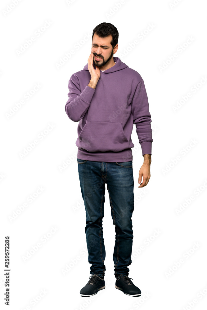 Full-length shot of Handsome man with sweatshirt with toothache over isolated white background Full-length shot of Handsome man with sweatshirt with toothache over isolated white background